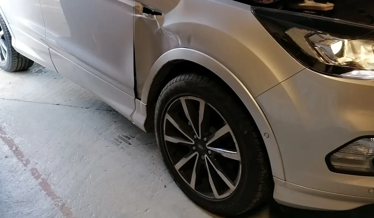 Silver Ford Dented